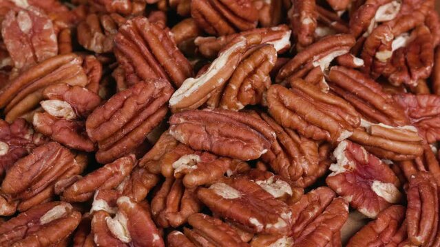 Healthy half pecans spinning on turntable