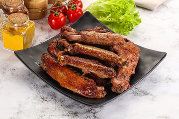 Roasted duck wings with sauce