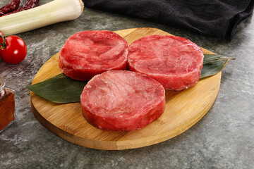 Delicous raw tuna medallion for cooking