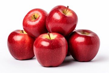 Ripe red apples displayed against a white background.