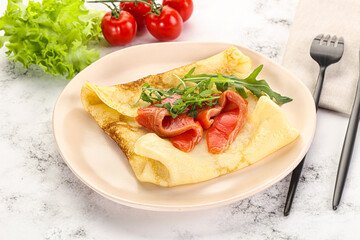 Russian pancake with salmon fish