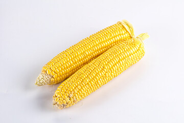 Sweet yellow raw corn cob