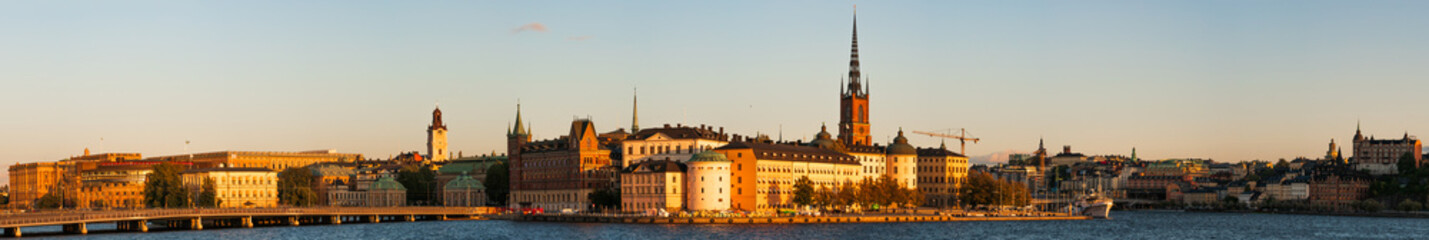 Stockholm, Sweden. Large panorama of the old city and of the island of Riddarholmen at sunset,...