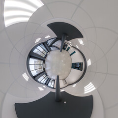abstractly twisted into a spherical 360 panorama interior of a modern office with a hall staircase and panoramic windows