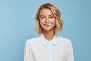 Cute woman with perfect smile on blue background - obrazy, fototapety, plakaty