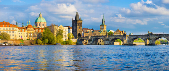 Panorama of old town with Charles Bridge on Vltava river and Old Town Bridge Tower, famous tourist...