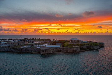 National Museum of Bermuda and rampart with sunset at the background in the former Royal Naval Dockyard in Sandy Parish, Bermuda. 