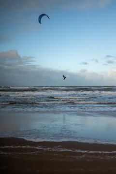 Kite boarding at the North Sea during the winter. 
