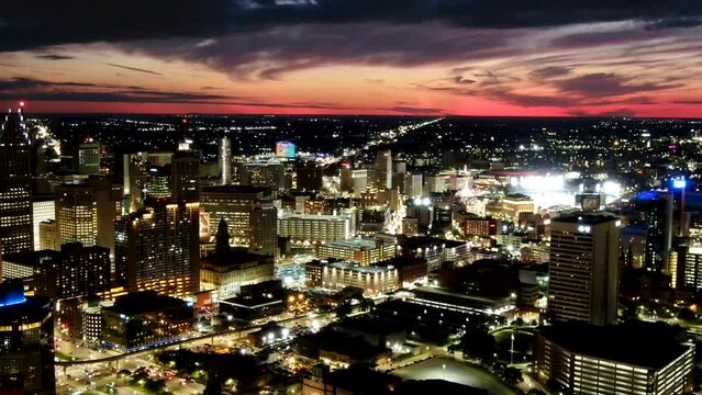 Detroit Michigan view of cityscape, night timelapse at sunset