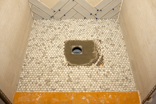 E Bathroom Shower Floor Being Tiled