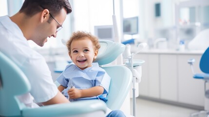 Boy patient child sitting in dentist chair smiling