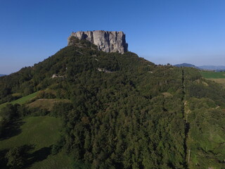 Naklejka premium Aerial view Bismantova stone, a famous climbing gym in the mountains of Reggio Emilia, Italy