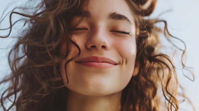 A Close Up of a Person with Curly Hair