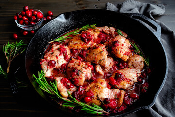 Rosemary Chicken Thighs with Cranberry Sauce: Boneless skinless chicken thighs cooked with...