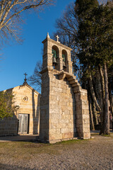 bell tower and church next to the castle of Montalegre