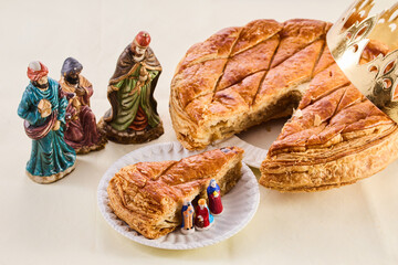 Epiphany cake on wooden table. Galette des rois traditional Epiphany cake in France