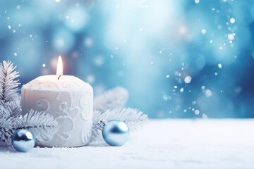 Obraz na płótnie Canvas Christmas Winter Advent Candle on Blue Background with Magic Bokeh Lights