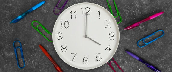 4 o'clock. Banner. Study or business time. Clock  with white clock face on dark background with...