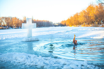 Feast of the Baptism of the Lord. The Orthodox rite of bathing in an ice-hole. Epiphany. believers...