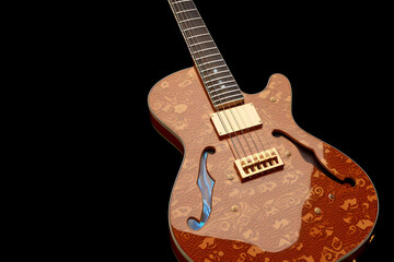 Naklejka premium guitar isolated on black background