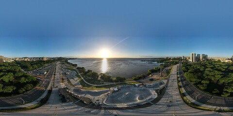 360 aerial photo taken with drone of skatepark at sunset