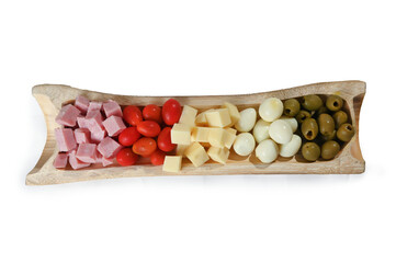 portion of cold snacks cheese ham olive oil