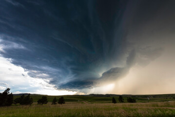 Naklejka na ściany i meble Amazing Storm Cloud Shapes Over Lush Farmland