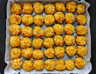 Baked Corn Flakes Cookies. Sorted on the tray.