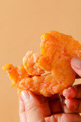 Shrimp steaks, snack made with shrimps and vegetables, children's food fried, golden and pink meat texture, closeup on tabletop indoors
