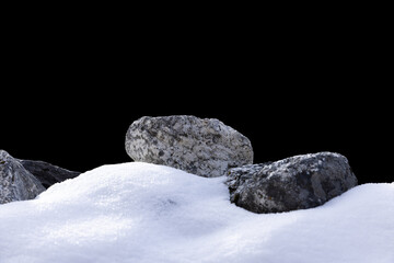 Flat stone podium with snow cover isolated on black background .Clipping path.