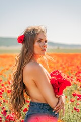 Obraz na płótnie Canvas Woman poppies field. portrait happy woman with long hair in a poppy field and enjoying the beauty of nature in a warm summer day.