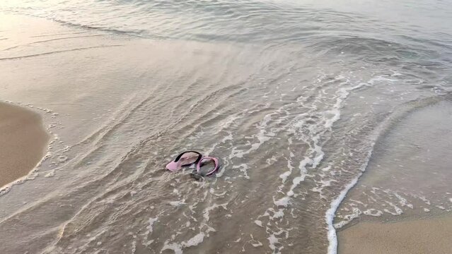Black Pink shoes at the beach
