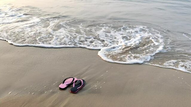 Black Pink shoes at the beach