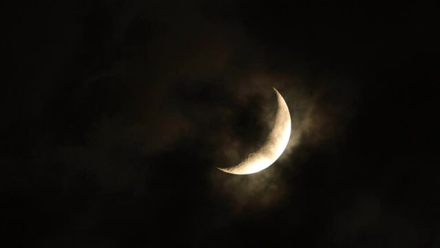 Crescent moon and cloud black sky