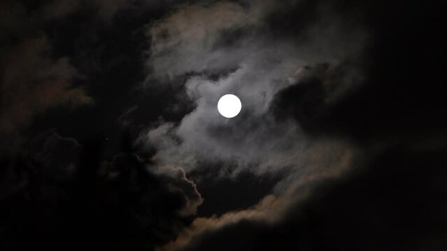 Full moon and cloud
