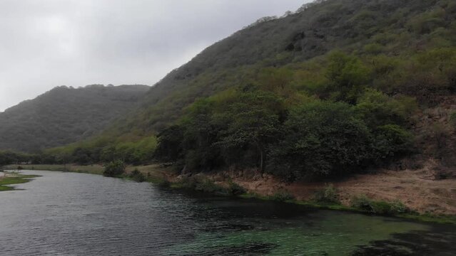 Wadi Darbat, with rain drops and green mountains