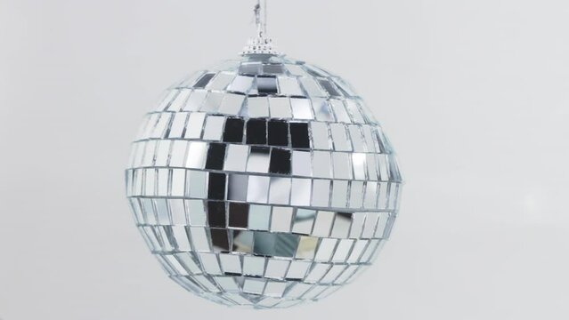 Retro silver disco ball rotating 