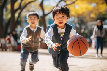 Childhood: Two Young Boys Playing Basketball in the Park
