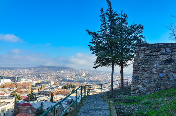 walk with panoramic city view near Narikala fortress in Tbilisi, Georgia 