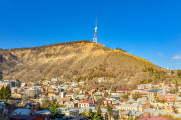 Tbilisi TV tower on Mtatsminda mountain and Sololaki district scenic view from Narikala trail	