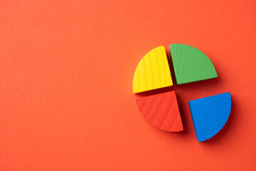 Colorful wooden pie chart pieces