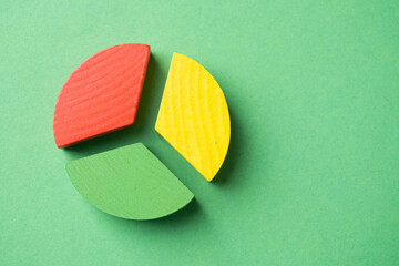 Colorful wooden pie chart pieces