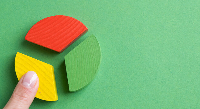Colorful wooden pie chart pieces