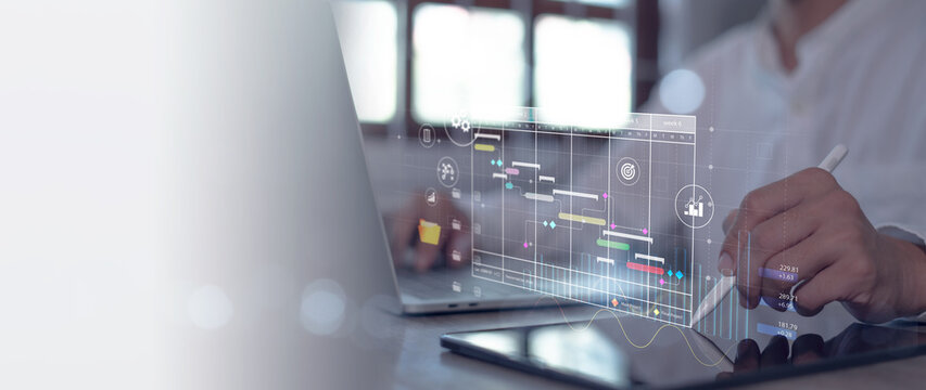 Project management Project manager work and schedule Gantt chart Businessman using a digital tablet Business operations Plans and strategies