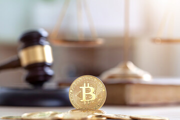 Auction gavel and bitcoin cryptocurrency money