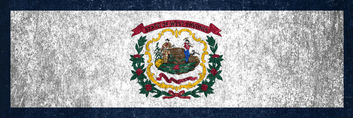 Banner of the grunge West Virginia state flag. Dirty West Virginia state flag on a metal surface.
