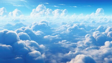 Beautiful aerial view above clouds with blue sky