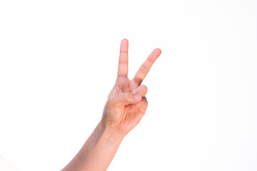 Woman showing index and middle fingers on isolated white background