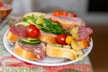 a mixture of sandwiches with fruit