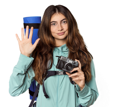 Caucasian woman with backpack and vintage camera smiling cheerful showing number five with fingers.